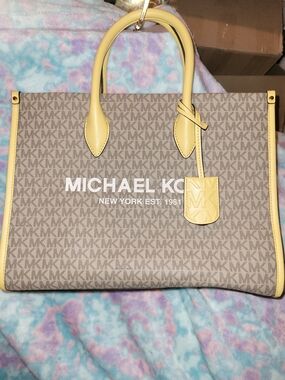 Michael Kors Purse With Yellow Trim And A Michael Kors Bright Yellow Wallet